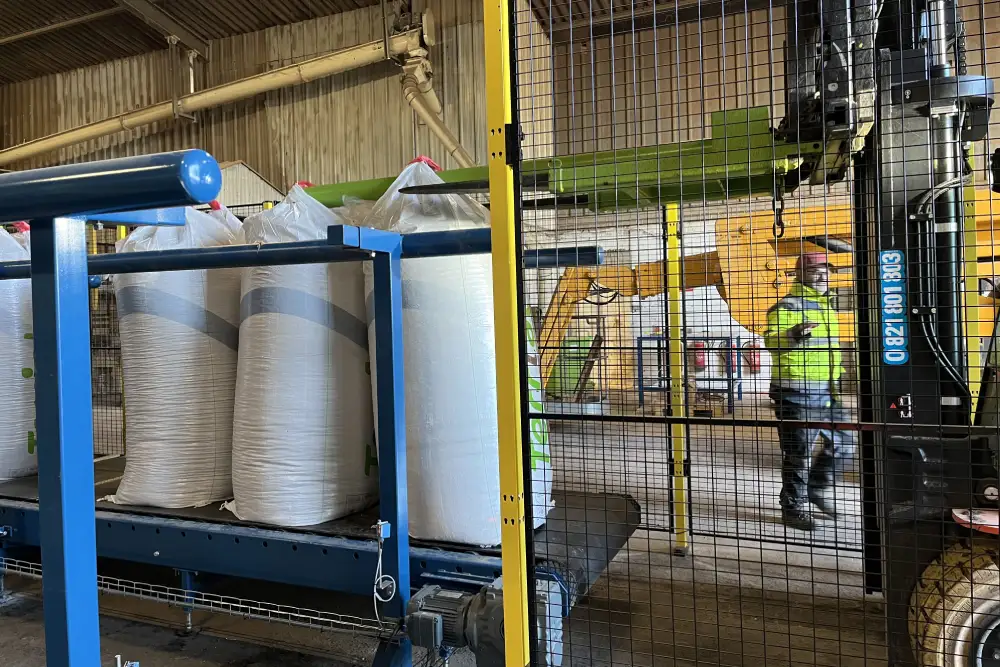 Evacuation des big bags via des convoyeurs à bande